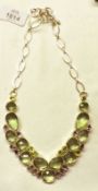 A white metal, Green and Lilac Amethyst Modernist Design Necklet, stamped “.925”