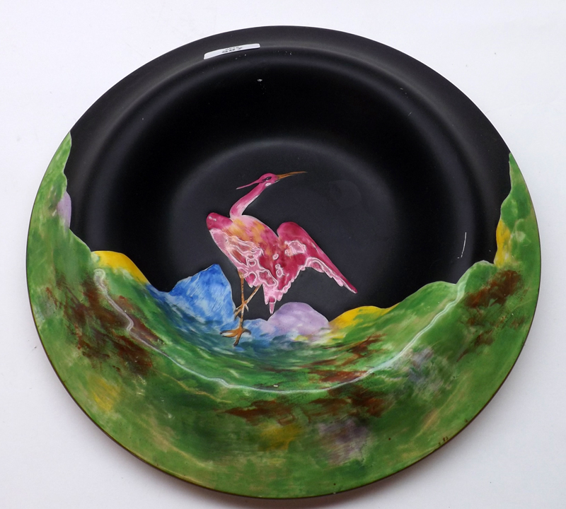An early 20th Century Crown Ducal Round Bowl, decorated with a coloured crane on a green and black