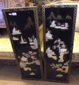 A pair of 20th Century Oriental Shibayama type Panels depicting figures on pagodas etc, 36” high,