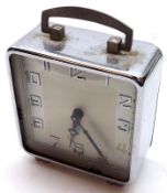 A Vintage Chromium Cased Bedside Alarm Clock, the back marked “DRPA”, 2 ½” wide