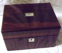 A small 19th Century Rosewood Vanity Box, with vacant mother-of-pearl nameplate and plain