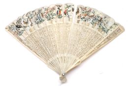 A late 19th/early 20th Century Ivory or Bone Fan, pierced sticks decorated with floral designs and