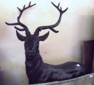 A large 20th Century Cast Metal Model of a stag, on round plinth base, approx 34” wide