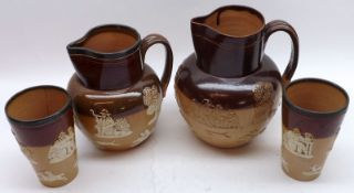 A Mixed Lot: two Doulton Lambeth Stoneware Water Jugs with sprigged hunting detail and a further