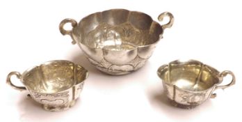 A pair of 18th Century white metal Miniature Cups, probably Moscow 1777; together with a further