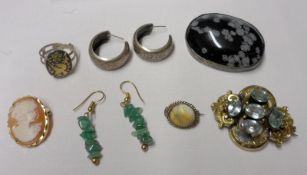 A Mixed Lot comprising: a Victorian Pinchbeck Brooch set with aquamarine type stones; a large