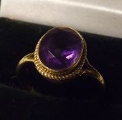 A hallmarked 9ct Gold oval Amethyst Dress Ring