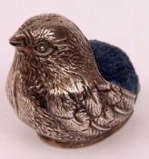 An early 20th Century Novelty Pin Cushion, modelled as a chick, Birmingham hallmark to base although