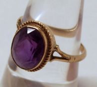 A hallmarked 9ct Gold oval Amethyst Stone Ring with split shoulders