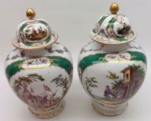 A pair of Augustus Rex Covered Jars, decorated with panels of rural scenes in various colours,
