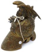 A 19th Century Novelty Brass Inkwell, formed as a hinged military helmet with dragon decoration,