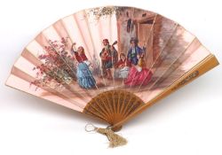 An early 20th Century Fan, the fabric panel painted with scene of Spanish dancers and musicians, 14”