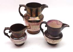 A graduated set of three 19th Century Copper and Puce Lustre Jugs, decorated with naïve scenes,
