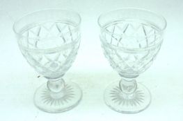 A set of six 20th Century Clear Cut Glass Wines, with knopped stems and round star-cut bases, 5”