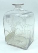 A late 18th Century Clear Glass Case Bottle decorated with cut detail of sprays of foliage, ground