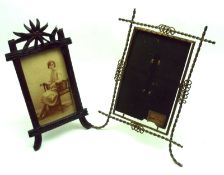 A 19th Century Brass Easel Backed Photograph Frame, together with a further Vintage Carved Wooden