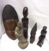 A group of three 20th Century Carved West African Hardwood Figures, the largest 13” high; together