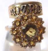 A 9ct Gold Mizpah Ring and a further yellow metal Ring marked 9ct set with orange stones (2)
