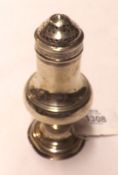 A George III Pepper Pot of typical form, pierced removable lid to a baluster body, raised on a round