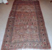 A Caucasian Runner with multi-gull border, large central panel of lozenges etc, mainly puce/beige/