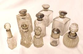 A Mixed Lot: nine various assorted small Clear Glass Dressing Table Jars and Bottles, with silver