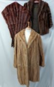 A Cream Musquash Fur Coat retailed by Brahames of Norwich, length 34”; together with a Brown