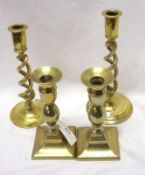 A pair of 19th Century Brass Candlesticks of squat baluster form with square bases and two further
