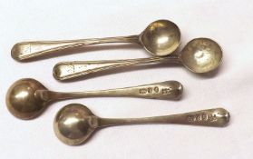 A set four George III Old English Thread design Salt Spoons, engraved with a crest of dog, London