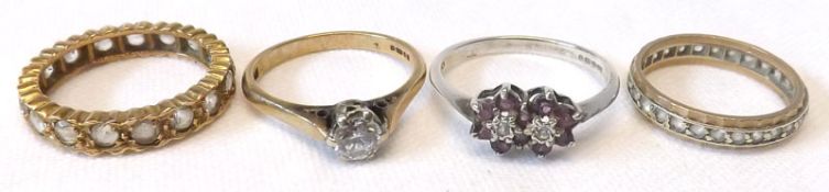 A collection of four various Eternity and Solitaire Rings, mainly unmarked