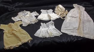 A bag of mixed vintage Dolls Clothes and Undergarments