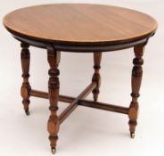 A 19th Century Gillows Oak Circular Dining Table, plain top and moulded edge, raised on four