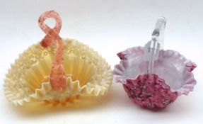 Two late 19th/early 20th Century Frilled Handled Glass Bon-Bon Baskets decorated in pinks, amber etc