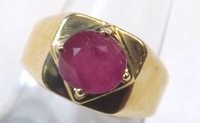 A hallmarked 9ct Gold Ring set with an oval Ruby