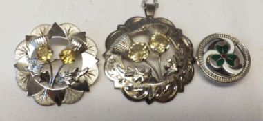 A hallmarked Silver Thistle Pendant set with Citrine type stones; together with an unmarked chain