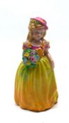 A W H Goss Small Figurine “Joan”, decorated in colours with a bunch of flowers and a yellow dress,