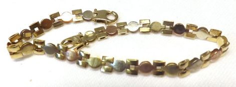 A Tri-colour yellow metal fancy link Bracelet, 19cm long, stamped “.375” and weighing approx 5 ½ gm