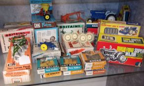 A Quantity of Britains Boxed Farm Implements to include: Ford Super Major 5000 Diesel Tractor No