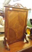 An early 20th Century Mahogany Fire Screen with scroll moulded handles and splay feet, 18 ¾” wide