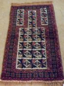 A small Caucasian Wool Prayer Rug, central geometric pattern within triple gull border, mainly black