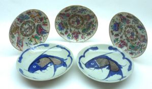 Three Canton Famille Rose Circular Saucer Dishes, each painted in colours with figures and
