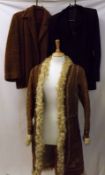 A 1970s Sheepskin Lined Afghan Coat, in brown suede with embroidered decoration, length 42”;
