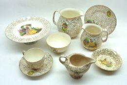 An Empire Ware part Tea Service, decorated with panel of crinoline lady with a gilt floral