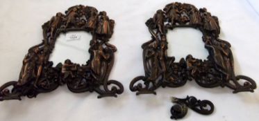 A pair of unusual decorative Cast Metal Photograph Frames, embossed with dancing figures in 18th