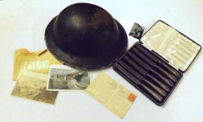 WWII period ARP Tin Helmet + set of six Silver-handled Butter Knives, cased + three Postcards