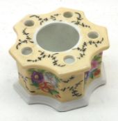 A French Font-formed Inkwell decorated with floral sprays on a beige background, 3 ½” wide