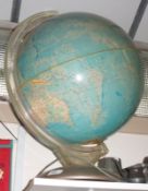 A large modern Electric Globe Light on round metal base