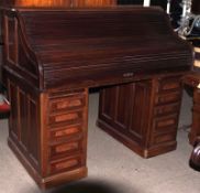 A late 19th/early 20th Century Mahogany Twin Pedestal Roll Front Desk, of typical form, the interior