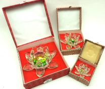 A boxed Graduated Set of three 20th Century Cut Glass Flower Models with mirrored centres, largest