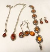 Two pairs of Amber stone set Drop Earrings; a Silver Chain with an Amber Pendant; a further Silver