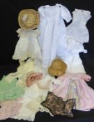 Two Boxes containing a quantity of vintage Dolls Clothes, to include Dresses, Skirts, Underwear,